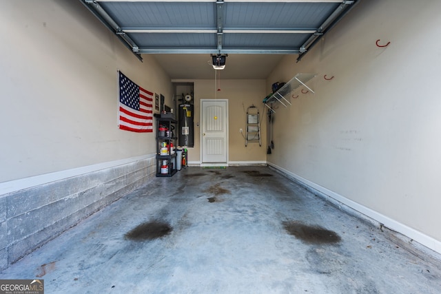 881 Ash St, Canton, GA 30114 - garage with a garage door opener and water heater