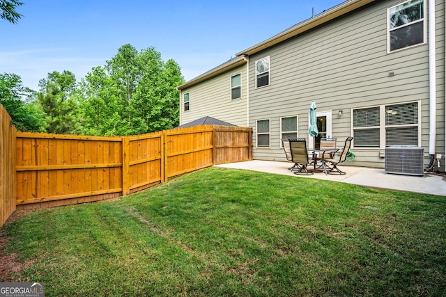 881 Ash St, Canton, GA 30114 - fenced backyard with a patio area