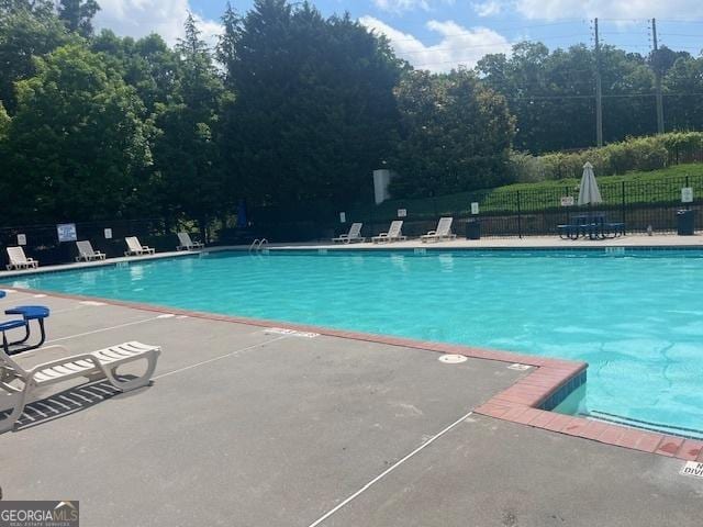 881 Ash St, Canton, GA 30114 - community pool with a patio area