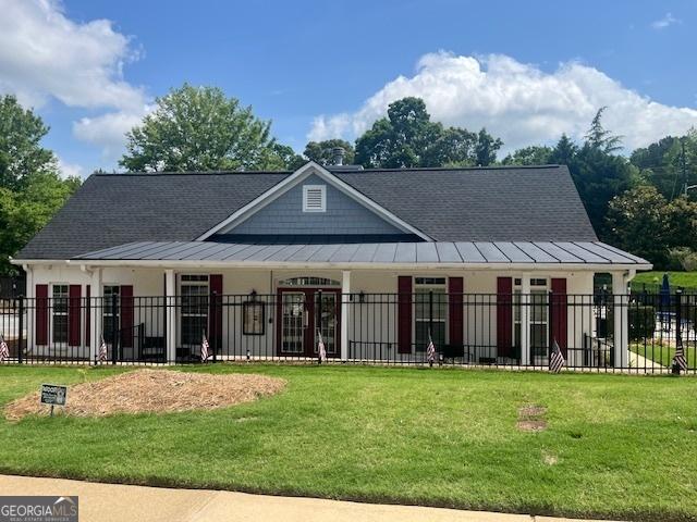 881 Ash St, Canton, GA 30114 - view of front of house with a standing seam roof and a metal roof