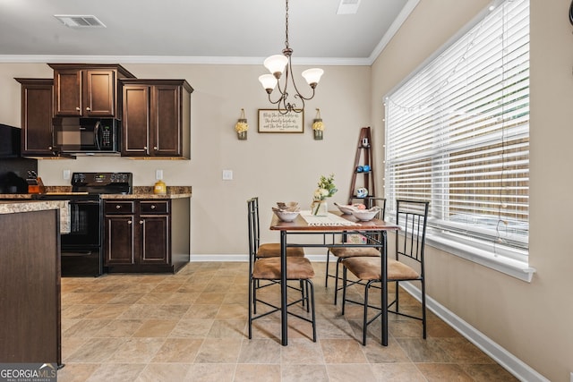 881 Ash St, Canton, GA 30114 - dining room with stone finish flooring, a chandelier, and ornamental molding