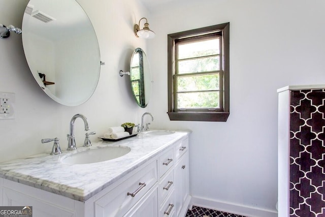 6715 Wright Rd, Sandy Springs, GA 30328 - bathroom with double vanity and baseboards
