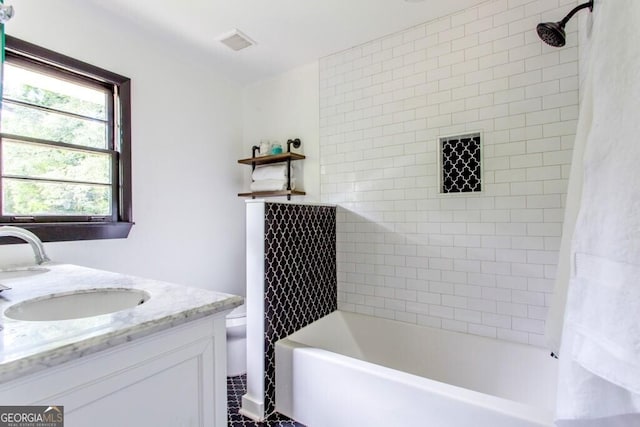 6715 Wright Rd, Sandy Springs, GA 30328 - bathroom with double vanity and shower / bath combo
