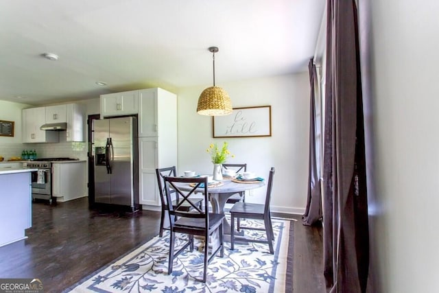 6715 Wright Rd, Sandy Springs, GA 30328 - dining area with dark wood-style flooring and baseboards