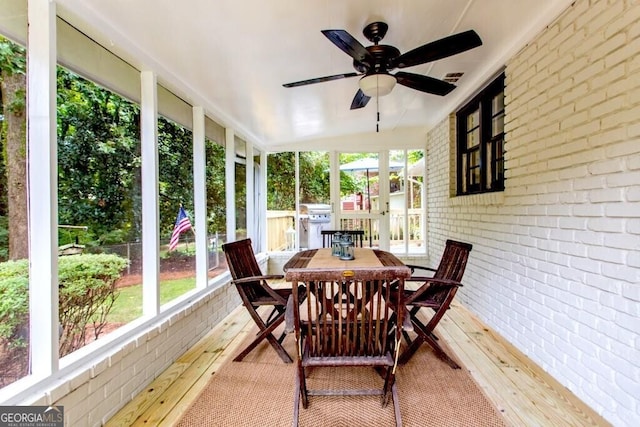 6715 Wright Rd, Sandy Springs, GA 30328 - sunroom / solarium with a ceiling fan and outdoor dining area