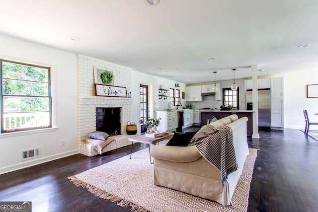 6715 Wright Rd, Sandy Springs, GA 30328 - living room featuring plenty of natural light, dark wood-type flooring, and recessed lighting