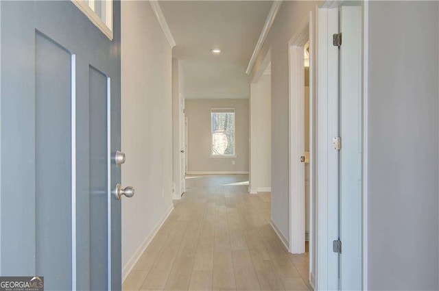 2525 Dixon Pl, Lawrenceville, GA 30045 - hallway with baseboards, crown molding, and light wood-style floors