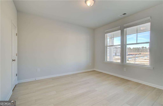 2525 Dixon Pl, Lawrenceville, GA 30045 - spare room with light wood finished floors and baseboards