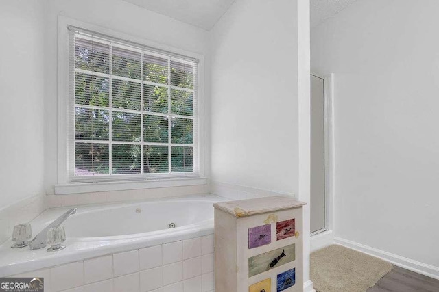 985 Laurel Springs Ln, Marietta, GA 30064 - bathroom featuring a jetted tub and a shower with shower door