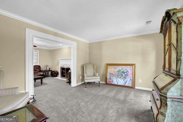 985 Laurel Springs Ln, Marietta, GA 30064 - living area featuring carpet, crown molding, a fireplace with flush hearth, and a textured ceiling