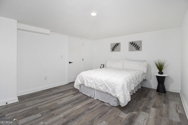 2537 Baker Rd NW, Atlanta, GA 30318 - bedroom featuring wood finished floors, baseboards, and recessed lighting
