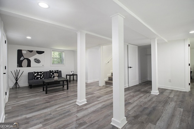 2537 Baker Rd NW, Atlanta, GA 30318 - below grade area featuring stairway, wood finished floors, baseboards, and recessed lighting