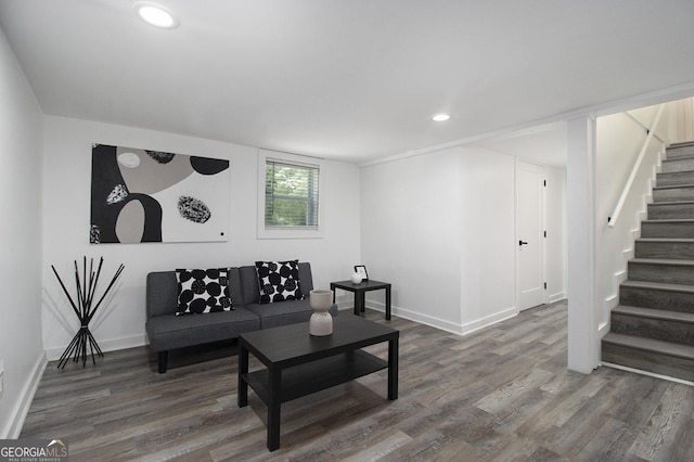 2537 Baker Rd NW, Atlanta, GA 30318 - living room featuring wood finished floors, stairs, baseboards, and recessed lighting