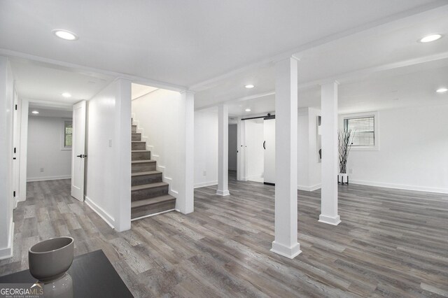 2537 Baker Rd NW, Atlanta, GA 30318 - below grade area with stairway, wood finished floors, baseboards, and recessed lighting