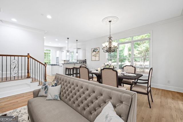 576 Cliftwood Ct, Sandy Springs, GA 30328 - living room featuring crown molding, a chandelier, stairway, light wood-style flooring, and recessed lighting