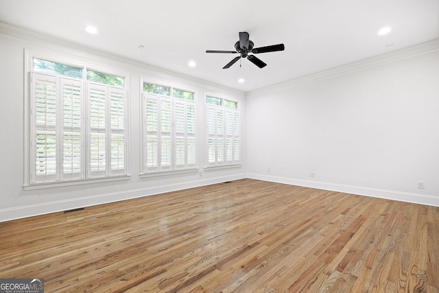 576 Cliftwood Ct, Sandy Springs, GA 30328 - empty room featuring plenty of natural light, crown molding, light wood-style flooring, a ceiling fan, and recessed lighting