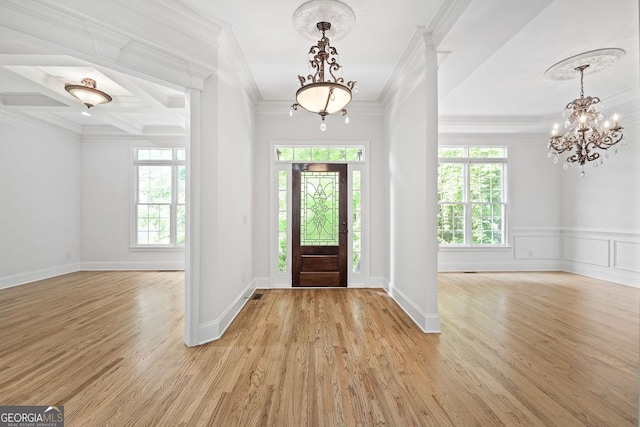 576 Cliftwood Ct, Sandy Springs, GA 30328 - foyer with a chandelier, plenty of natural light, ornamental molding, and light wood finished floors