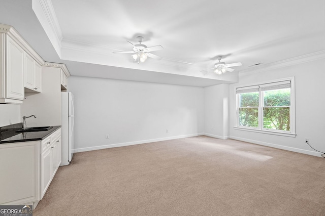 576 Cliftwood Ct, Sandy Springs, GA 30328 - kitchen featuring crown molding, a ceiling fan, light carpet, and freestanding refrigerator