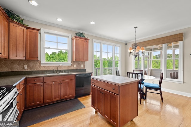 541 Brown Dr, Clermont, GA 30527 - kitchen with dishwasher, a sink, light wood-style flooring, a chandelier, and tasteful backsplash