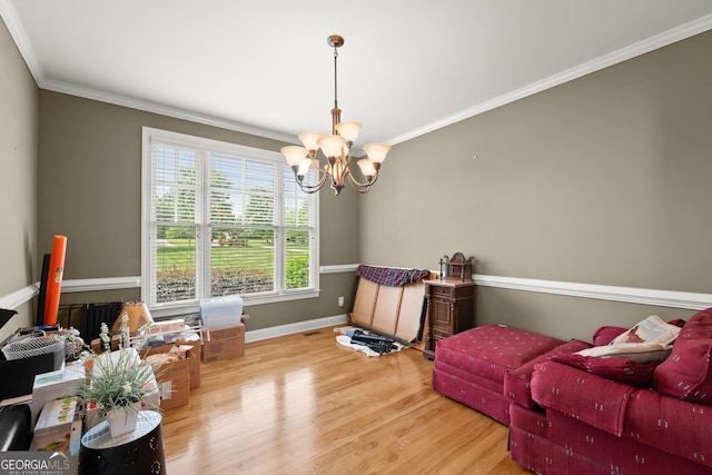 541 Brown Dr, Clermont, GA 30527 - sitting room featuring a chandelier, wood finished floors, crown molding, and baseboards