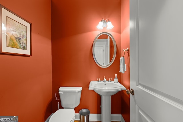 541 Brown Dr, Clermont, GA 30527 - bathroom featuring toilet and a sink