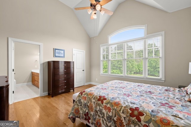 541 Brown Dr, Clermont, GA 30527 - bedroom featuring high vaulted ceiling, light wood-type flooring, connected bathroom, baseboards, and ceiling fan