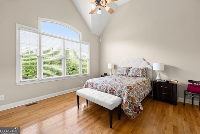 541 Brown Dr, Clermont, GA 30527 - bedroom featuring baseboards, wood finished floors, ceiling fan, and high vaulted ceiling