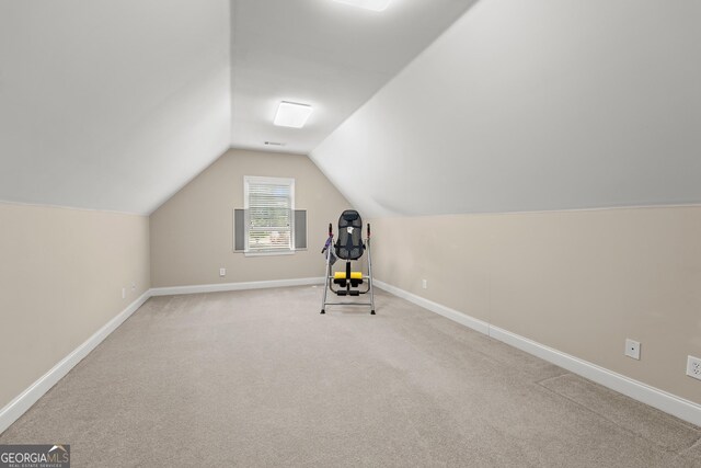 541 Brown Dr, Clermont, GA 30527 - rec room featuring baseboards, lofted ceiling, and carpet flooring