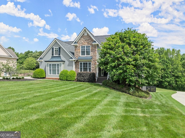 541 Brown Dr, Clermont, GA 30527 - view of front of property featuring stone siding and a front lawn