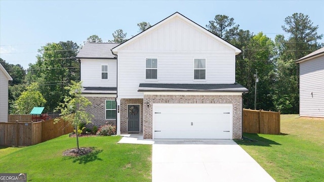 218 Lookout Dr, Dallas, GA 30132 - view of front of home with brick siding, board and batten siding, a garage, and concrete driveway