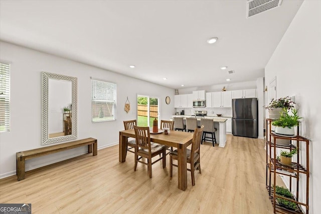 218 Lookout Dr, Dallas, GA 30132 - dining space featuring light wood finished floors and recessed lighting