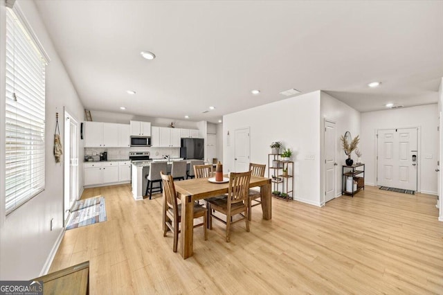 218 Lookout Dr, Dallas, GA 30132 - dining space featuring light wood finished floors and recessed lighting