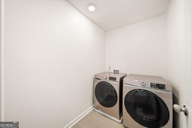 218 Lookout Dr, Dallas, GA 30132 - laundry area featuring washer and dryer and baseboards