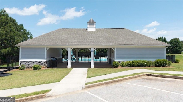 218 Lookout Dr, Dallas, GA 30132 - view of home's community with a pool and uncovered parking