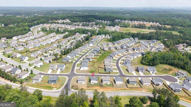218 Lookout Dr, Dallas, GA 30132 - aerial overview of property's location with a heavily wooded area and nearby suburban area