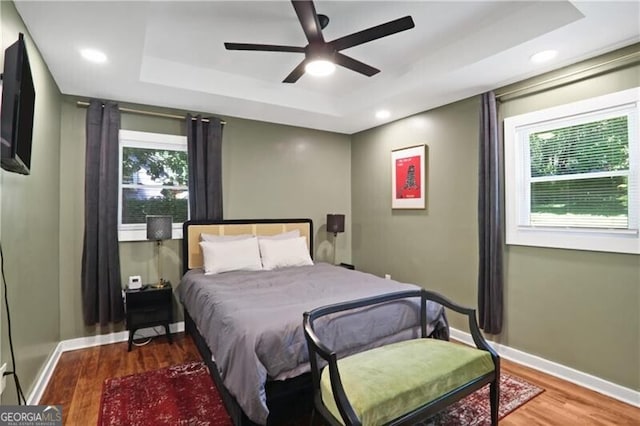 1202 Key Rd SE, Atlanta, GA 30316 - bedroom with a tray ceiling, wood finished floors, baseboards, and recessed lighting