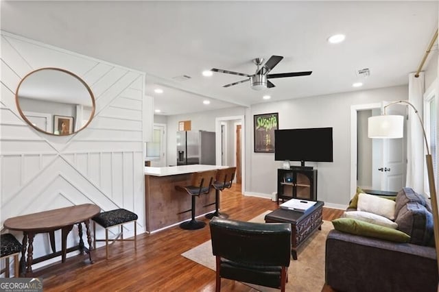 1202 Key Rd SE, Atlanta, GA 30316 - living area with wood finished floors, ceiling fan, recessed lighting, and baseboards