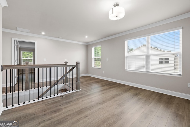 272 Broadstone Blvd, Acworth, GA 30101 - spare room featuring ornamental molding, wood finished floors, baseboards, and recessed lighting