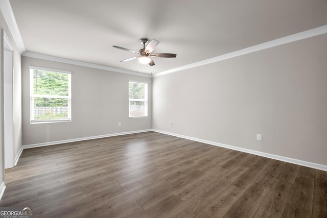 272 Broadstone Blvd, Acworth, GA 30101 - spare room with ornamental molding, a ceiling fan, dark wood-style floors, healthy amount of natural light, and baseboards