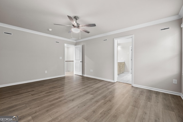 272 Broadstone Blvd, Acworth, GA 30101 - empty room with a ceiling fan, wood finished floors, baseboards, and ornamental molding