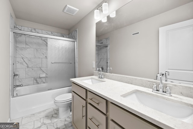 272 Broadstone Blvd, Acworth, GA 30101 - bathroom with marble look tile flooring, toilet, double vanity, and combined bath / shower with glass door