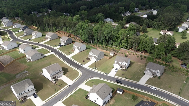 272 Broadstone Blvd, Acworth, GA 30101 - aerial view of property and surrounding area featuring nearby suburban area and a heavily wooded area