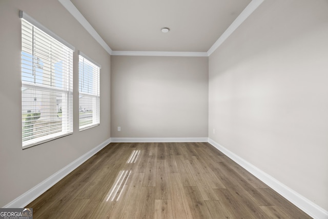 272 Broadstone Blvd, Acworth, GA 30101 - empty room featuring crown molding, wood finished floors, and baseboards