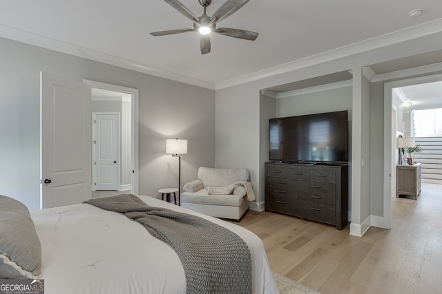 4781 Falling Brook Dr, Flowery Branch, GA 30542 - bedroom with light wood-type flooring, baseboards, crown molding, and ceiling fan