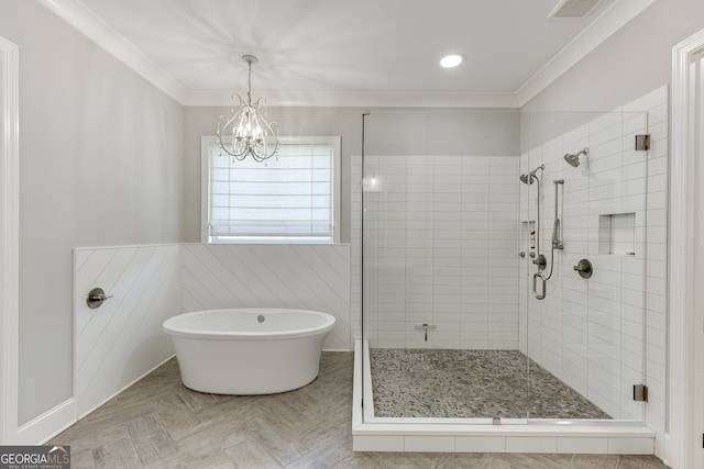 4781 Falling Brook Dr, Flowery Branch, GA 30542 - bathroom with ornamental molding, a freestanding bath, a stall shower, and a chandelier