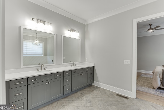 4781 Falling Brook Dr, Flowery Branch, GA 30542 - full bath featuring ornamental molding, double vanity, baseboards, and a ceiling fan