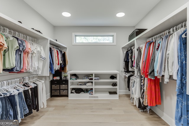 4781 Falling Brook Dr, Flowery Branch, GA 30542 - spacious closet with wood finished floors
