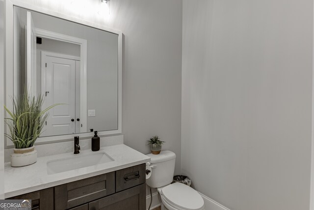 4781 Falling Brook Dr, Flowery Branch, GA 30542 - half bath featuring toilet and vanity