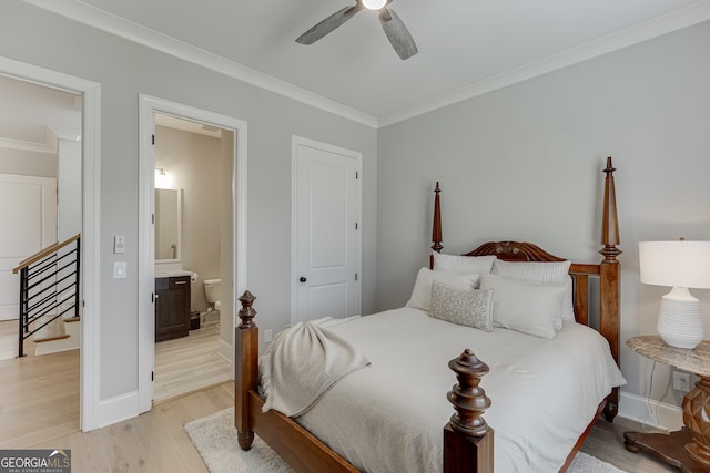 4781 Falling Brook Dr, Flowery Branch, GA 30542 - bedroom with light wood finished floors, crown molding, ensuite bathroom, a ceiling fan, and baseboards