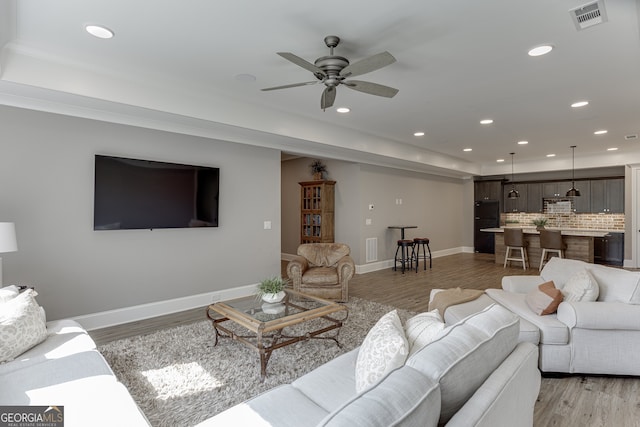 4781 Falling Brook Dr, Flowery Branch, GA 30542 - living area with recessed lighting, a ceiling fan, light wood-type flooring, and baseboards